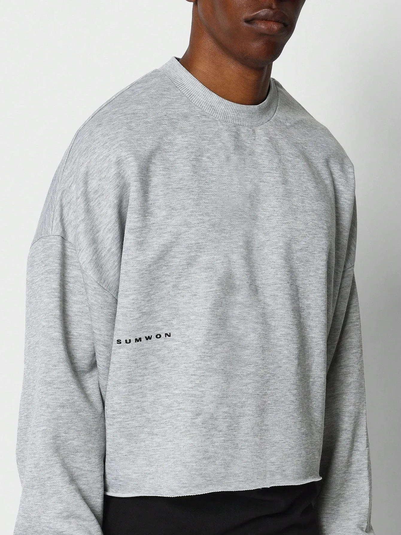 SUMWON Crop Fit Raw Hem Sweatshirt With Back Graphic Print