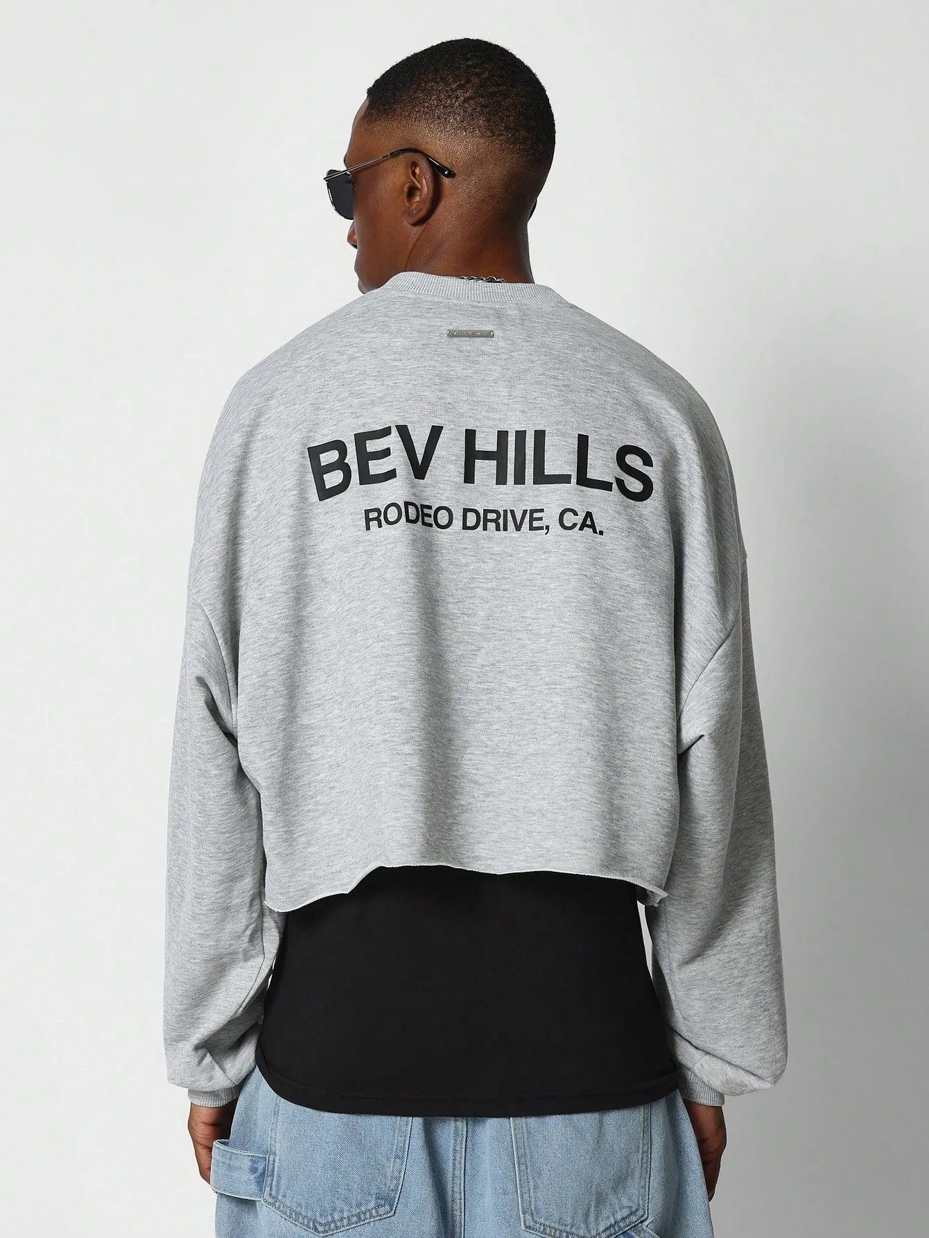 SUMWON Crop Fit Raw Hem Sweatshirt With Back Graphic Print