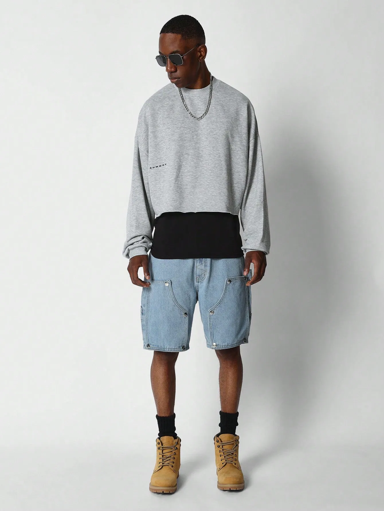 SUMWON Crop Fit Raw Hem Sweatshirt With Back Graphic Print