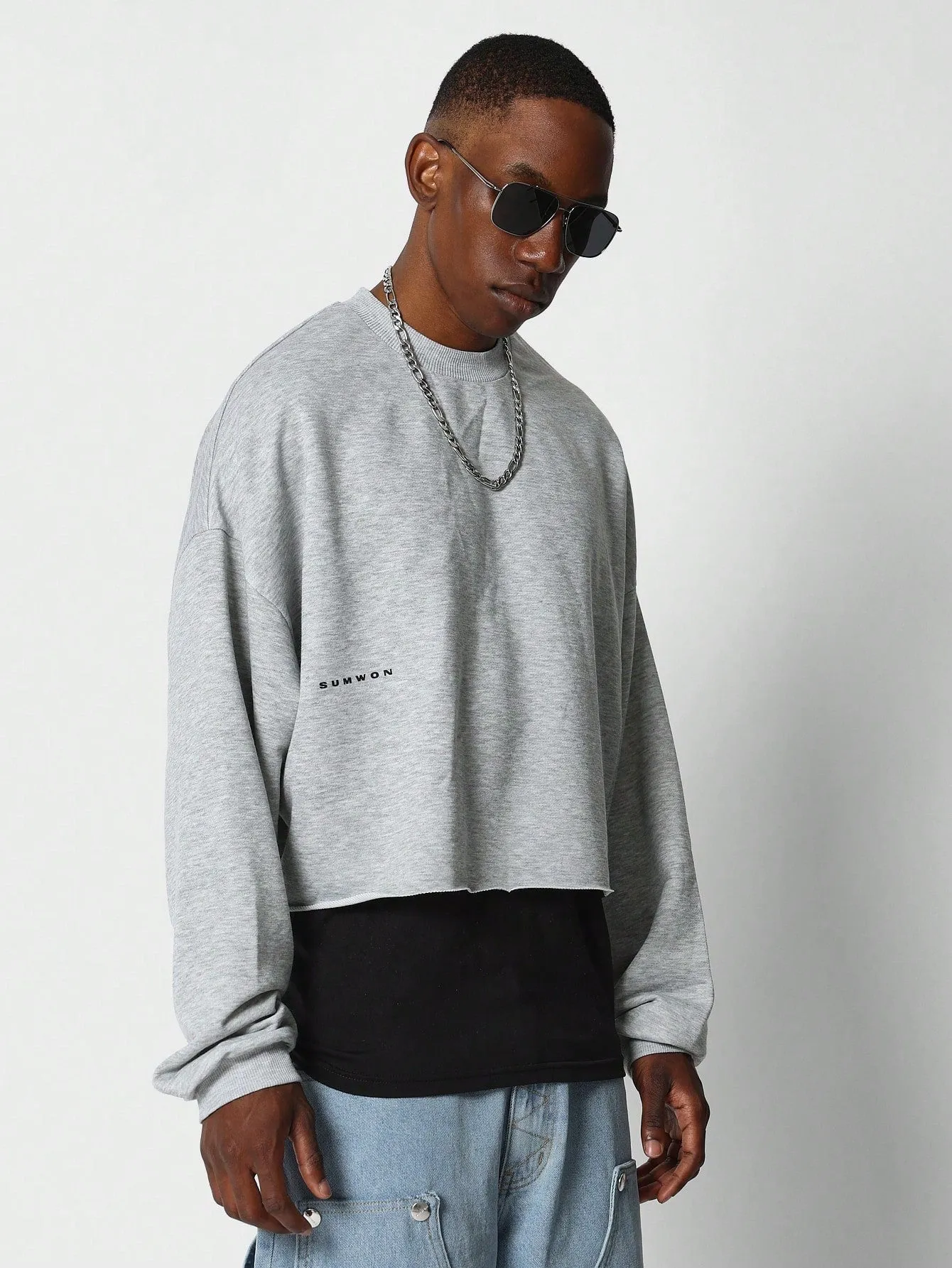 SUMWON Crop Fit Raw Hem Sweatshirt With Back Graphic Print